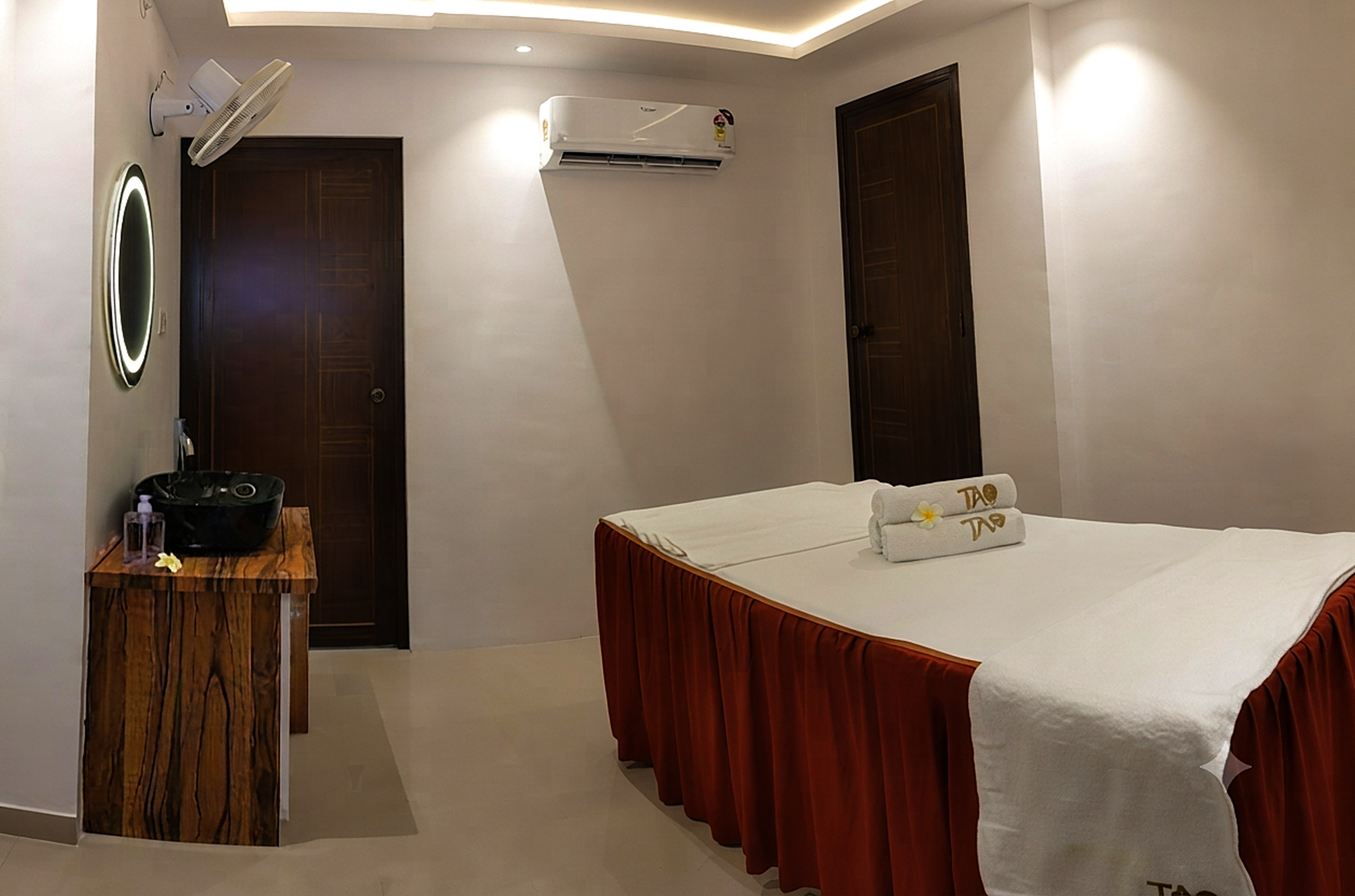 A treatment suite dressed with fresh Tao linen